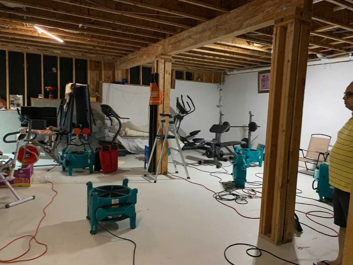 Basement drying equipment setup for Contents Cleaning & Restoration in Sioux Center